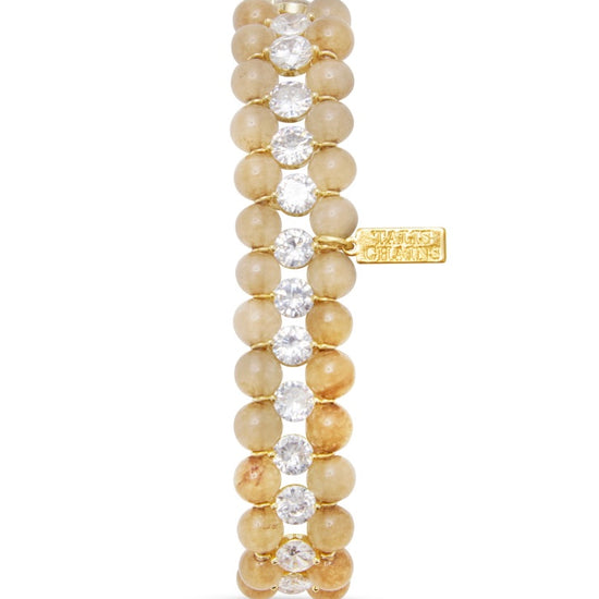 elasticated beaded bracelet with cz stones around the middle 