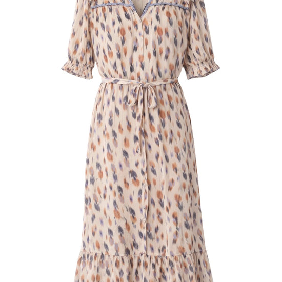 cream patterned dress with a belt and colourful poka dotts