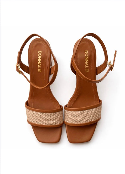Tan heeled sandal with raffia detail across toe