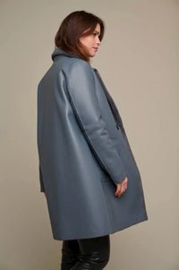 Dark grey faux leather reversible coat with faux fur lining and double entry pockets