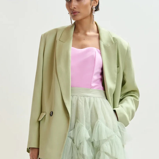 light green double breasted oversized blazer from essentiel antwerp model shot