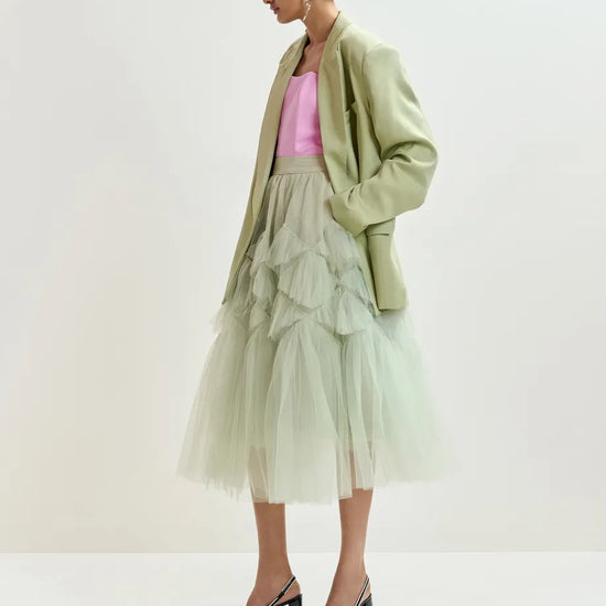 light green double breasted oversized blazer from essentiel antwerp side 