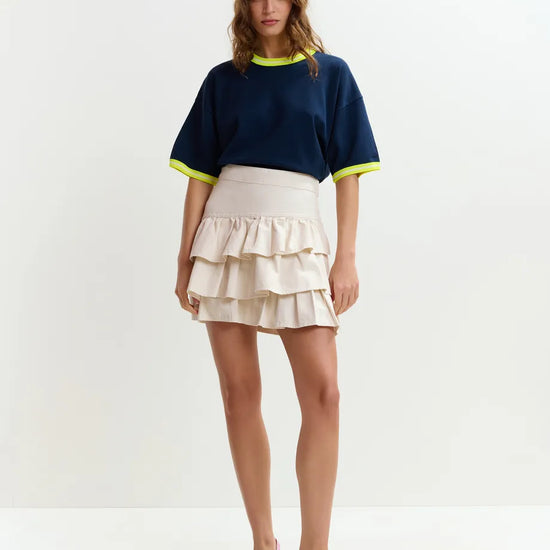 navy blue short sleeve top with yellow trim from essentiel antwerp model