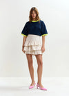 navy blue short sleeve top with yellow trim from essentiel antwerp model