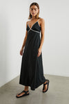 Black midi length dress with white trim at the bust and straps