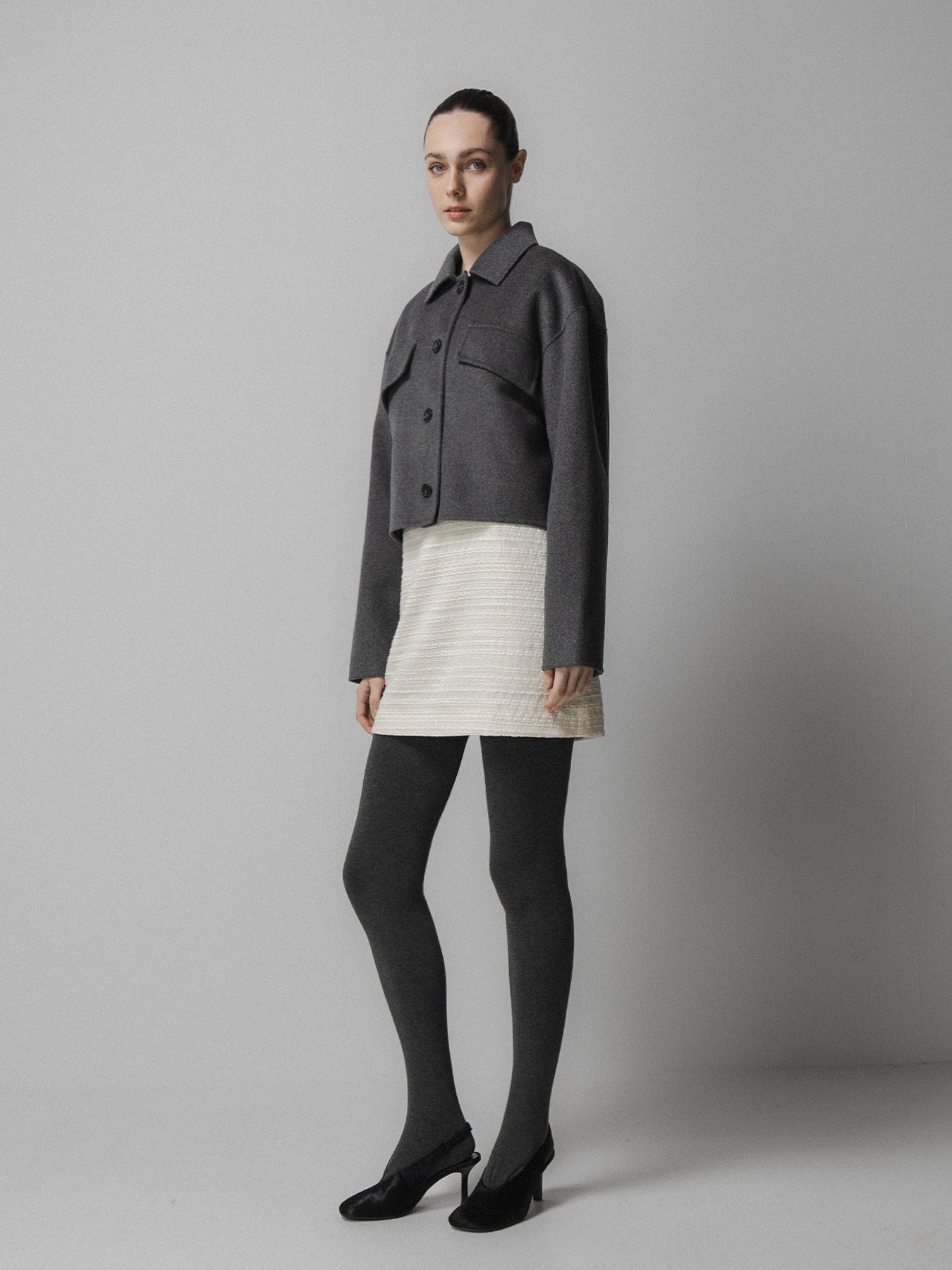 charcoal grey cashmere wool mix jacket with slanted welt flap pockets side view