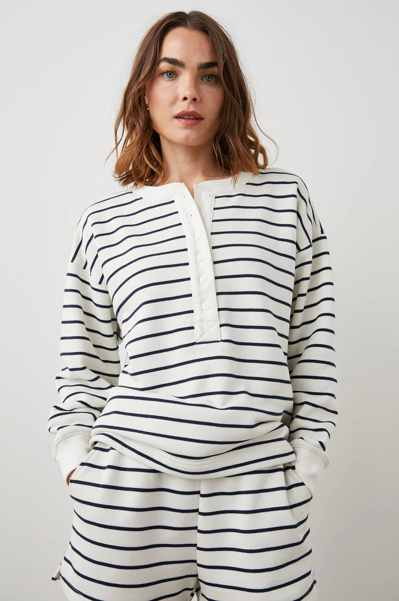 Ecru and navy striped jersey sweat top with half placket and button fastening