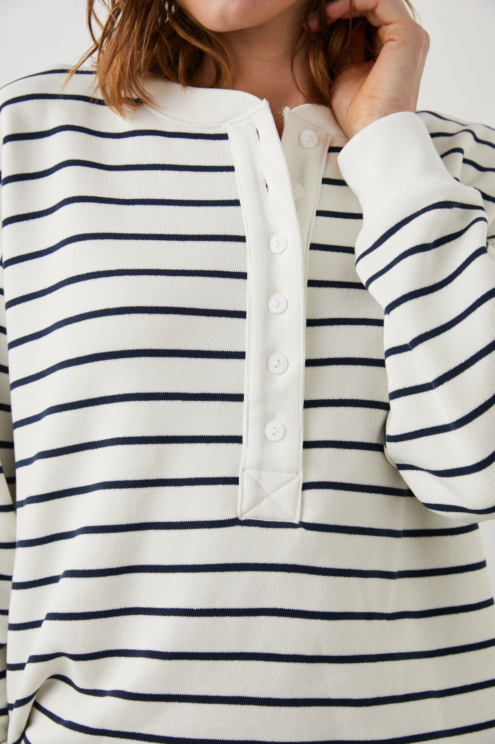 Ecru and navy striped jersey sweat top with half placket and button fastening