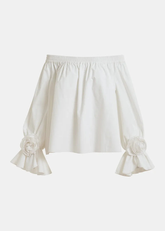 White blouse with ruffled sleeves on a white background