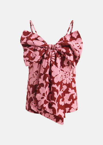 Pink floral top with bow detail on a white background