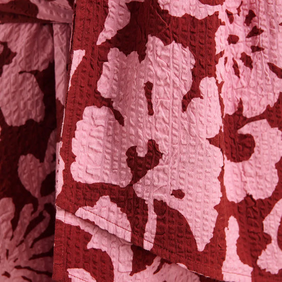 Close-up of a red and white floral patterned fabric