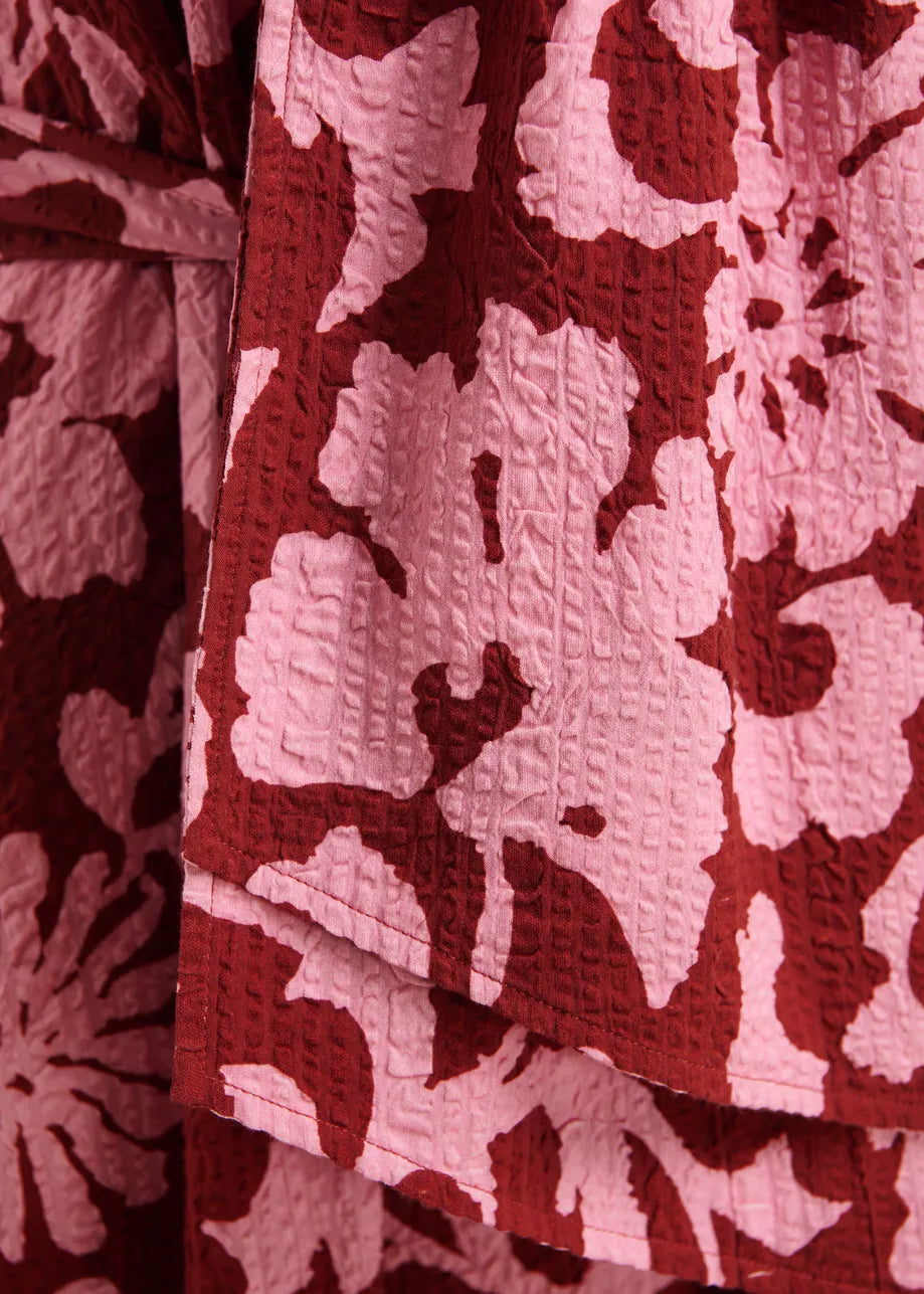 Close-up of a red and white floral patterned fabric