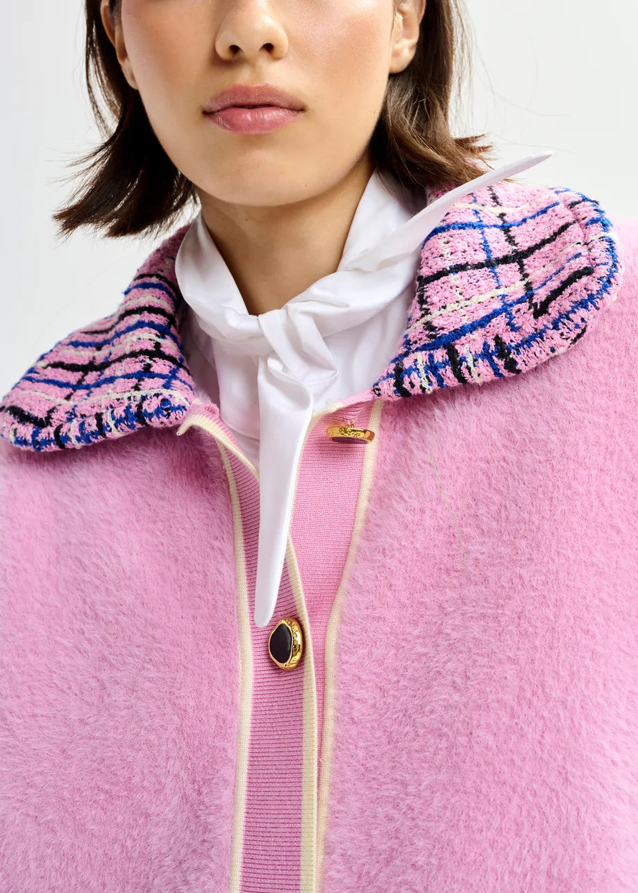 pink textured jacket with pattern collar and patch pockets close up