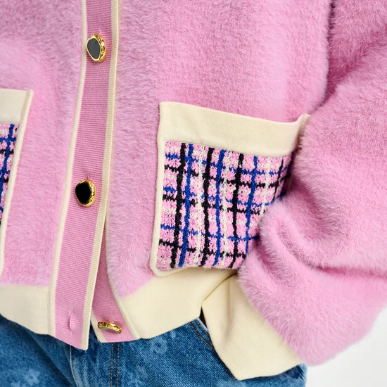pink textured jacket with pattern collar and patch pockets close up