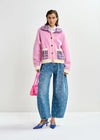 pink textured jacket with pattern collar and patch pockets model