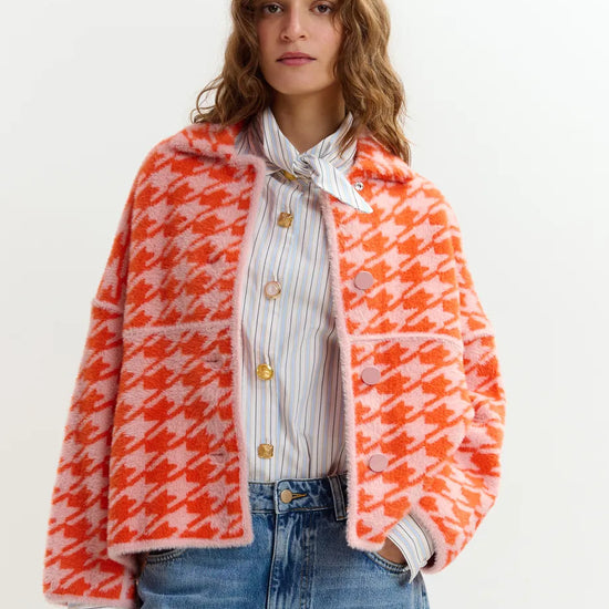 houndstooth red textured jacket with pink background model