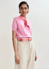 short sleeve pink knit with tie at the neck model