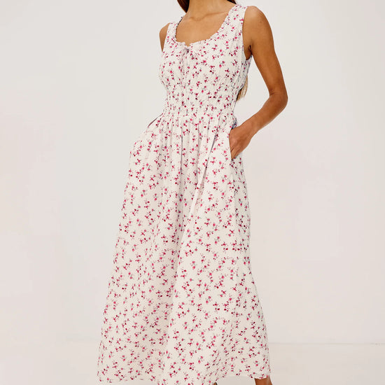 Woman wearing floral Rails dress another angle