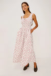 Woman wearing floral Rails dress another angle