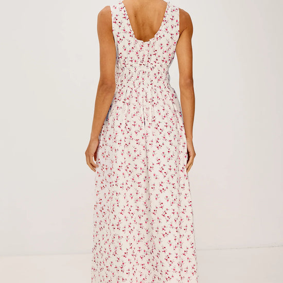 Woman wearing floral Rails dress rear view