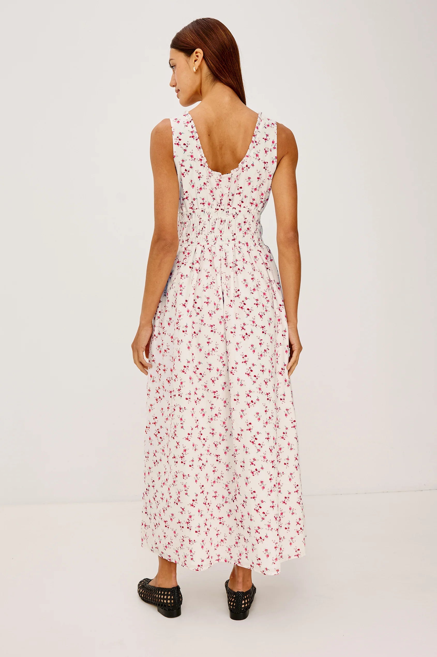 Woman wearing floral Rails dress rear view