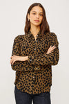 brown shirt with black spot print with long sleeves and chest pocket model shot