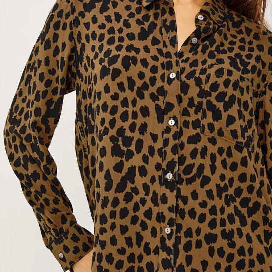 brown shirt with black spot print with long sleeves and chest pocket model shot close up