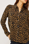 brown shirt with black spot print with long sleeves and chest pocket model shot close up