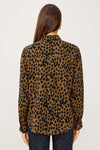 brown shirt with black spot print with long sleeves and chest pocket rear view