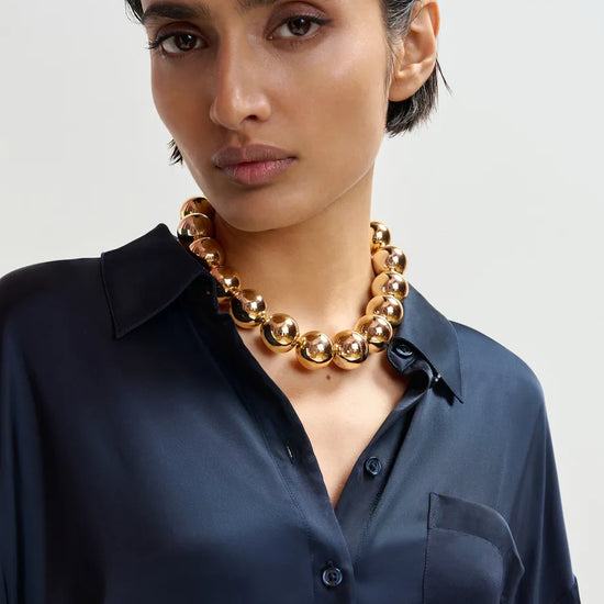 navy blue satin chest pocket shirt  close up