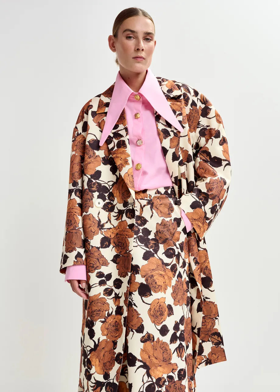 brown floral print double breasted mid length coat  model