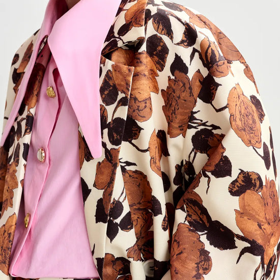 brown floral print double breasted mid length coat  close up