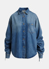 Blue denim shirt on a light gray background