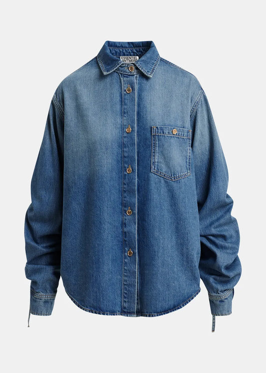 Blue denim shirt on a light gray background