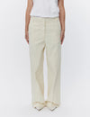 ecru relaxed trousers with optional tie belt and side pockets model shot