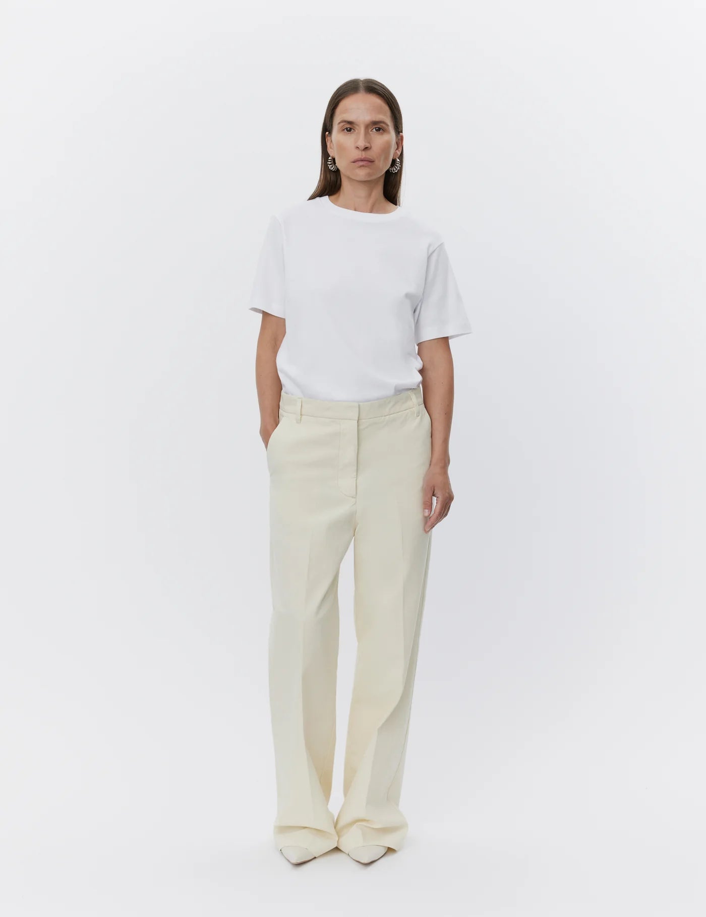 ecru relaxed trousers with optional tie belt and side pockets 