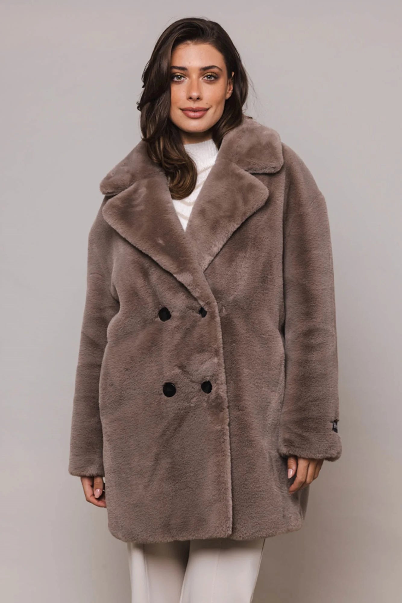 Taupe double breasted mid-length faux fur coat with brown buttons and classic collar