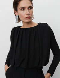 Black shimmery cropped top with gathered details