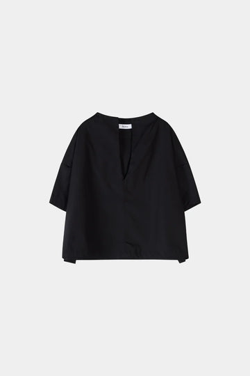 Black blouse on a light gray background