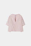 Pink blouse with a V-neckline on a white background