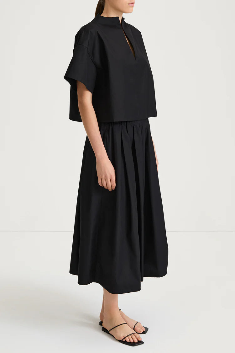 Person wearing a black outfit on a white background from Stylein