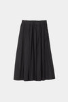 Black skirt on a light gray background