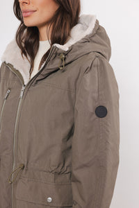 khaki reversible hooded coat with pockets and faux fur interior  close up