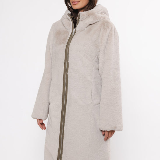 khaki reversible hooded coat with pockets and faux fur interior worn the other way