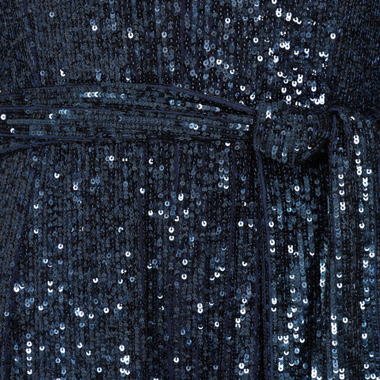 navy sequin jumpsuit with v neck, long sleeves and shoulder pads close up