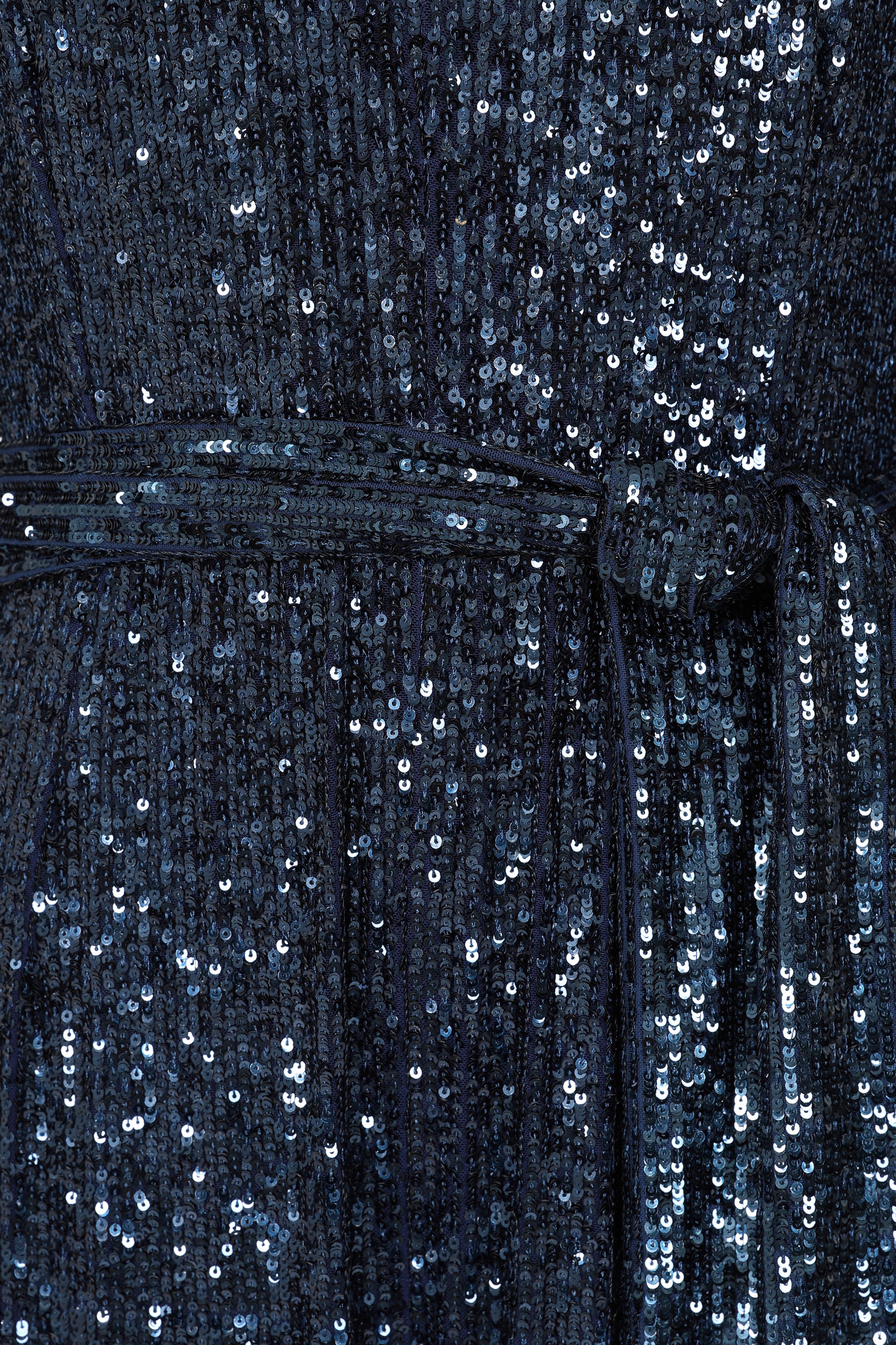 navy sequin jumpsuit with v neck, long sleeves and shoulder pads close up