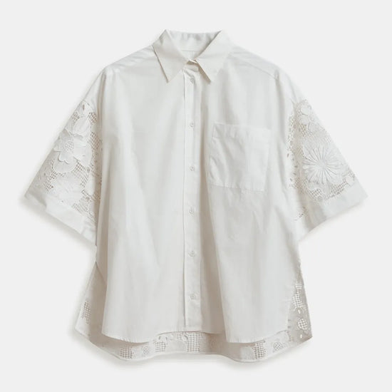 White blouse with lace sleeves on a white background