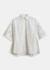 White blouse with lace sleeves on a white background