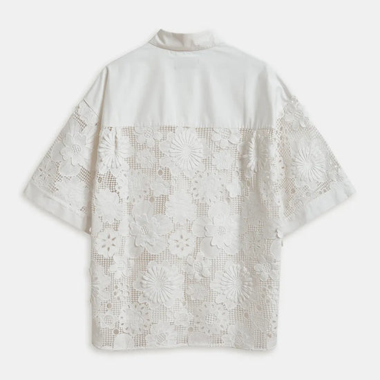 White lace shirt on a white background