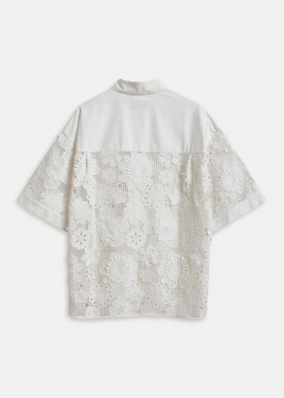 White lace shirt on a white background